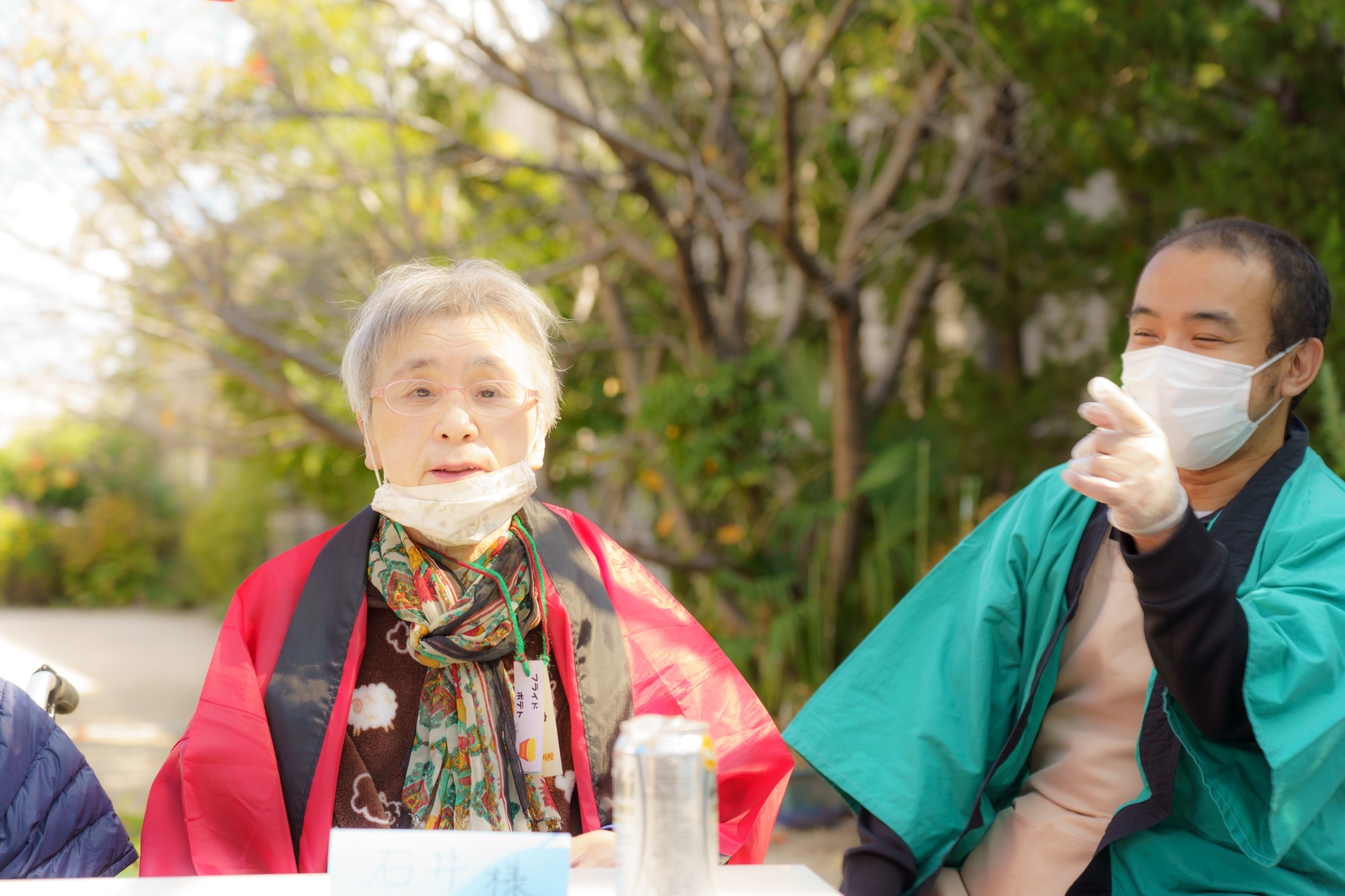 写真：利用者さんと従業員